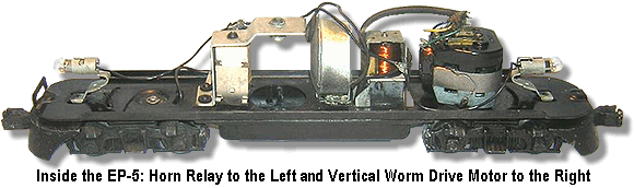 Inside the EP-5: Showing the horn relay to the left and the vertical worm drive motor to the right