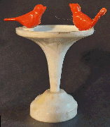 Fountain with red birds